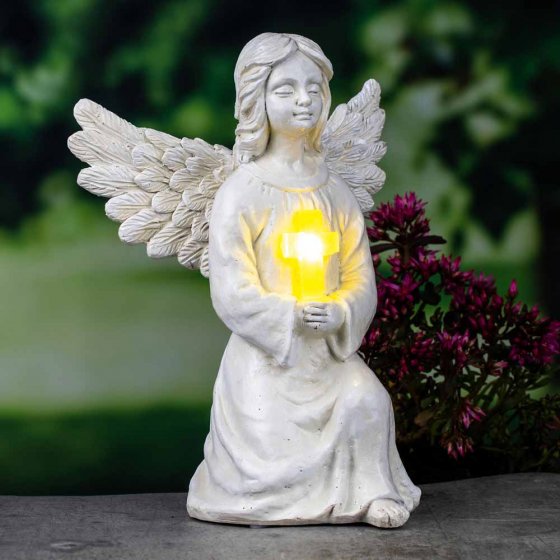 Ange solaire avec croix lumineuse 