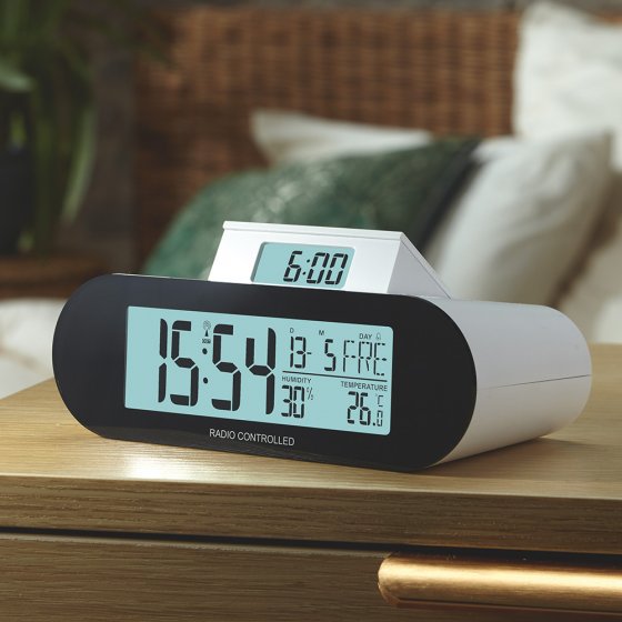 Réveil radiopiloté avec écran « pop-up »