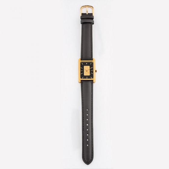 Montre lingot d’or et diamant 