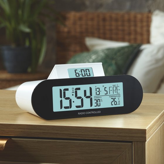 Réveil radiopiloté avec écran « pop-up »