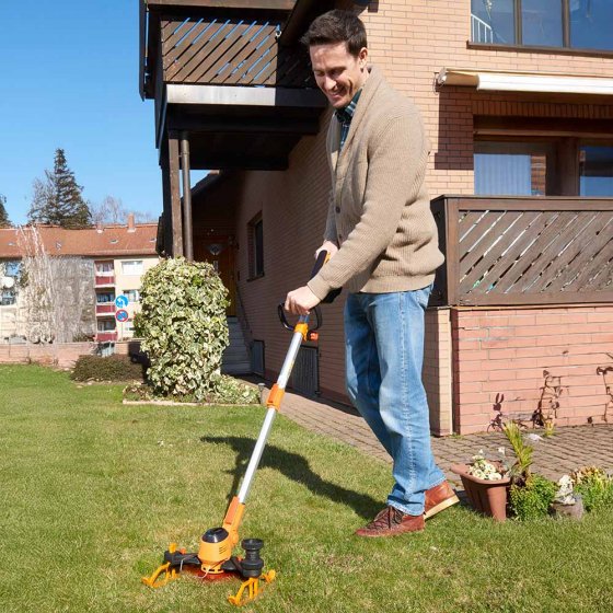 Coupe-gazon sans fil avec patins de guidage 