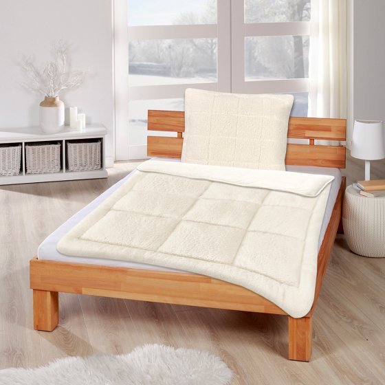 Oreiller aspect peau d’agneau 