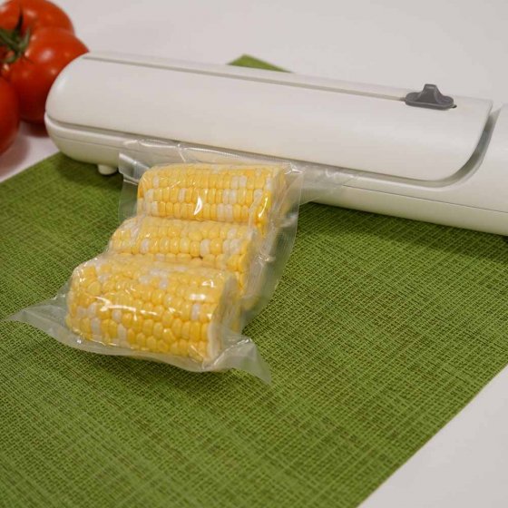 Machine de mise sous vide avec couteau intégré 