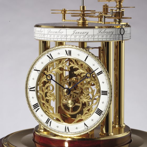 Pendule astrolabe laiton/acajou