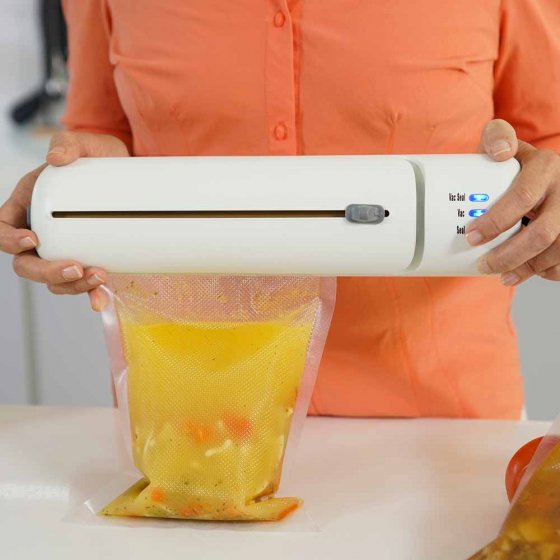 Machine de mise sous vide avec couteau intégré 